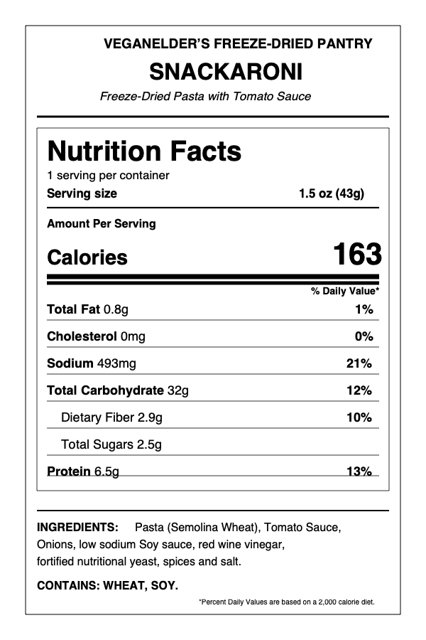 A Nutrition Facts label for VEGANELDER'S FREEZE-DRIED PANTRY SNACKARONI freeze-dried pasta with tomato sauce, showing serving size 1.5 oz (43g) and calories 163 and 6.5g Protein and 0.8g Fat