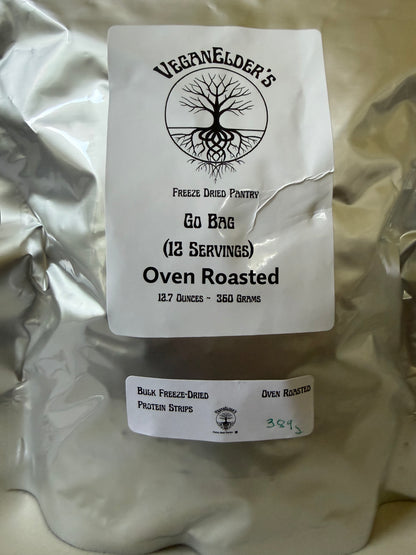 A silver foil bag of Veganelder's bulk freeze-dried protein strips, oven roasted, with two white labels on a light beige background.