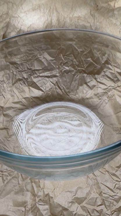 Video of plant protein strips in a bowl being rehydrated with water.