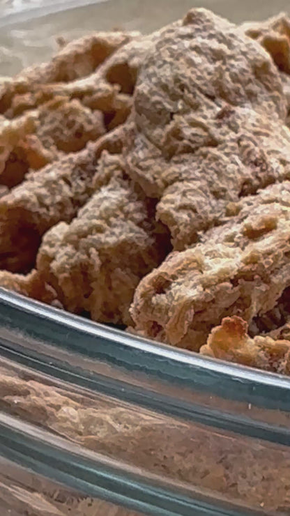 Video of plant protein strips that have been freeze dried in a bowl.